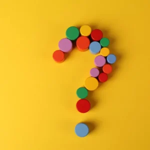 Colorful question mark on a yellow background for psnuser.com FAQs
