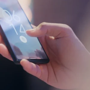 Smartphone locked with a fingerprint sensor for secure account access